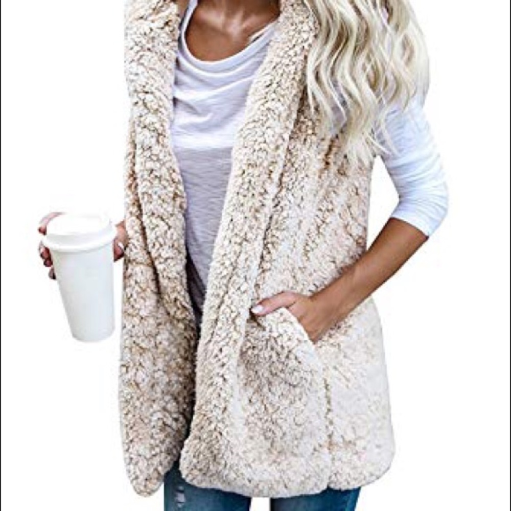 mieeion white fuzzy vest